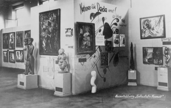 A Nazi exhibition of “Degenerate Art” at the Munich Hofgarten, 1937. Paul Klee’s “Swamp Legend” is hanging at the bottom center of the Dada wall.